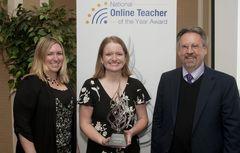 Allison Powell of iNACOL, award winner Kristin Kipp and Myk Garn of SREB