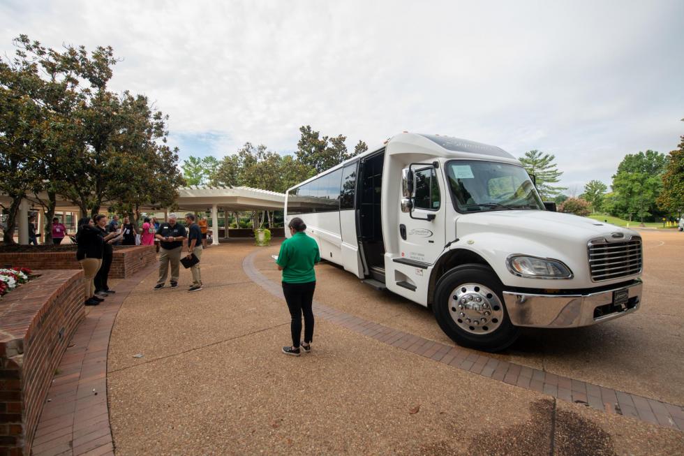 A bus gets ready to transport attendees at the 2024 conference