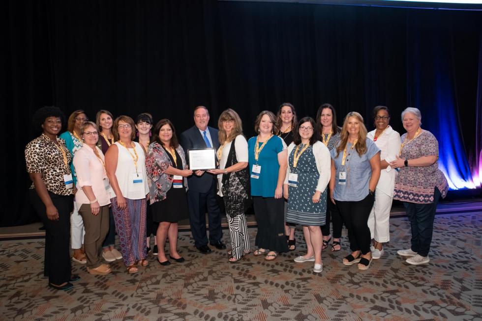 Picture of Ouachita Parish receiving SREB Outstanding District Award