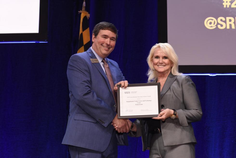 Picture fo Alice Davis accepting the Susquehanna County Career & Technology Center's Pacesetter School Award