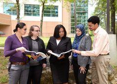 Dr. Cynthia Taylor (center), interacting with her students