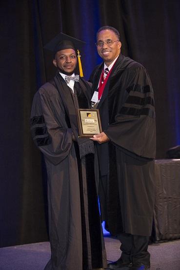 Dr. Archie Taylor poses with Dr. Ansley Abraham