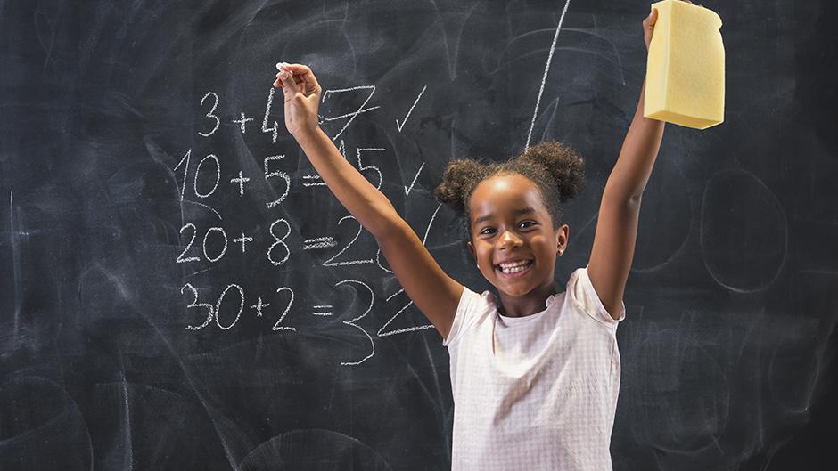 Excited student working math problem