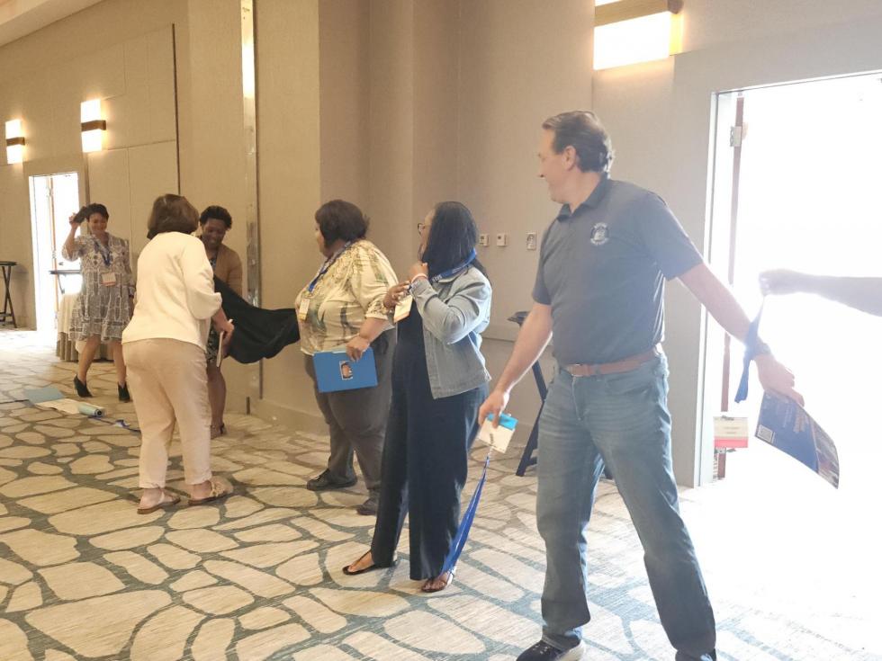 Attendees forming a long line