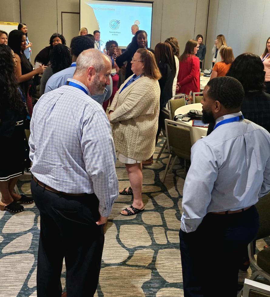 Attendees divide themselves into groups