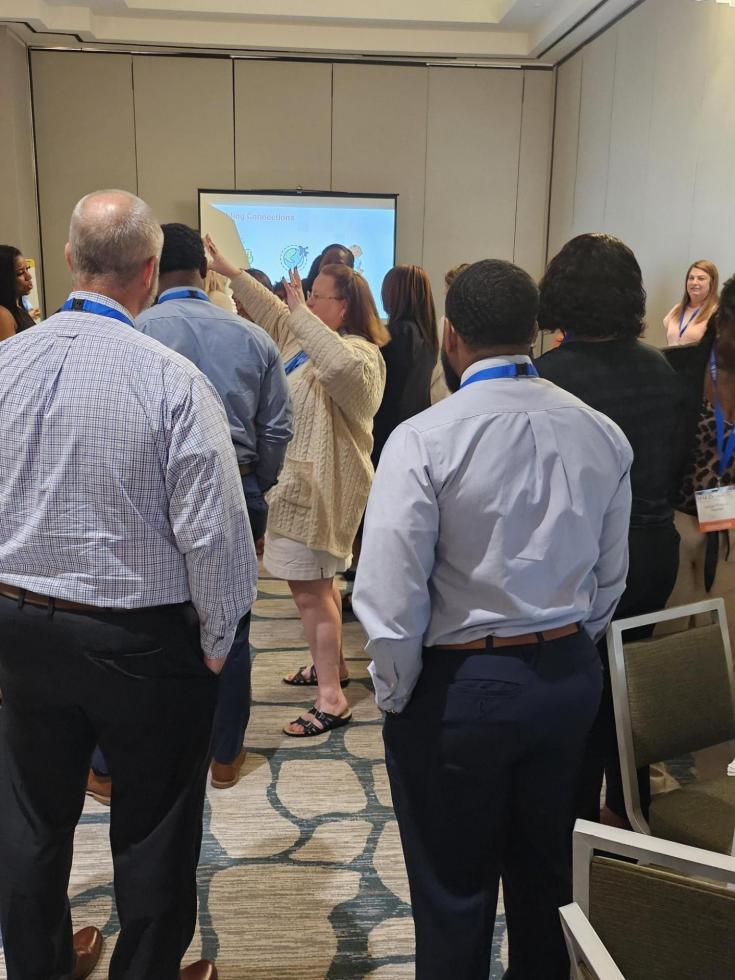 Attendees enjoy the session