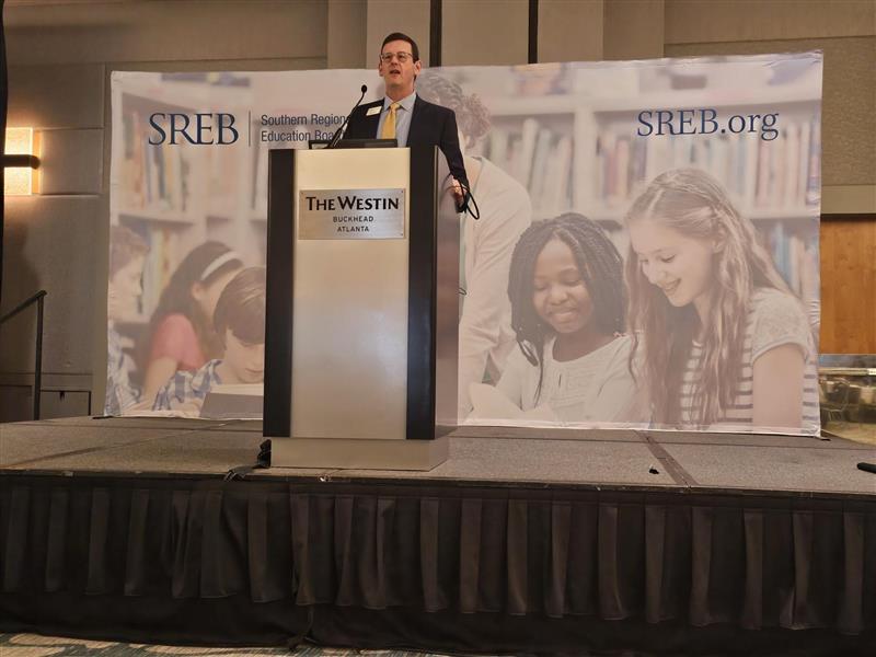 Jason Adair speaking at the conference