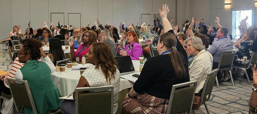 Attendees participate at Fletcher's session