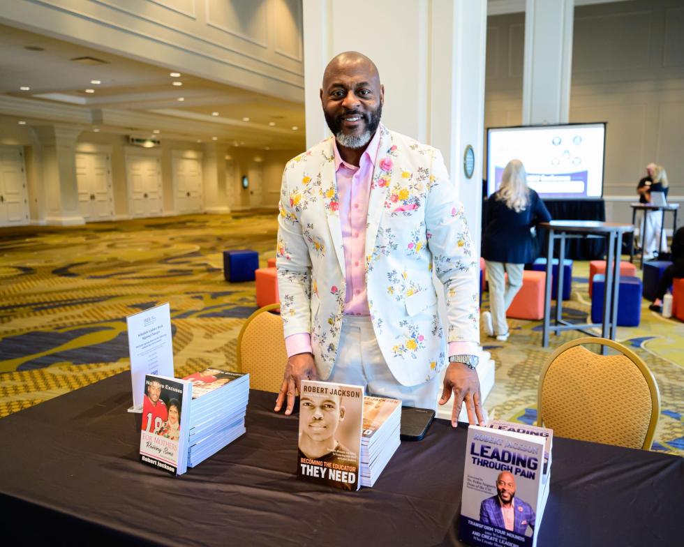 A 2026 author gets ready for his signing.