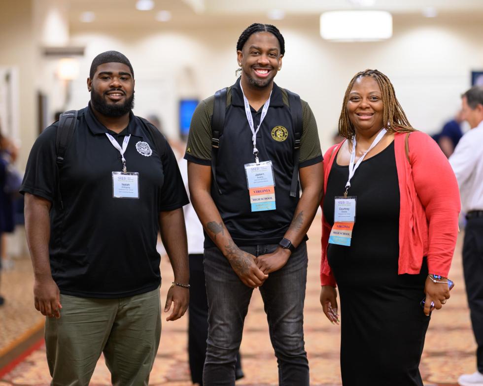 2026 attendees pose for a picture