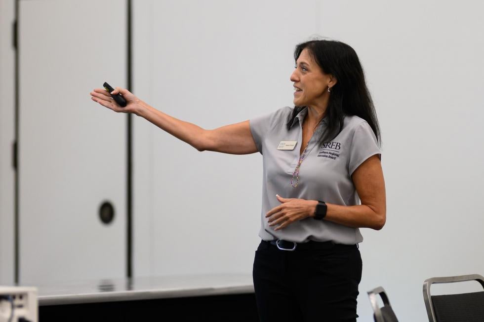 Aimee Wyatt presents in a session at the 2025 conference