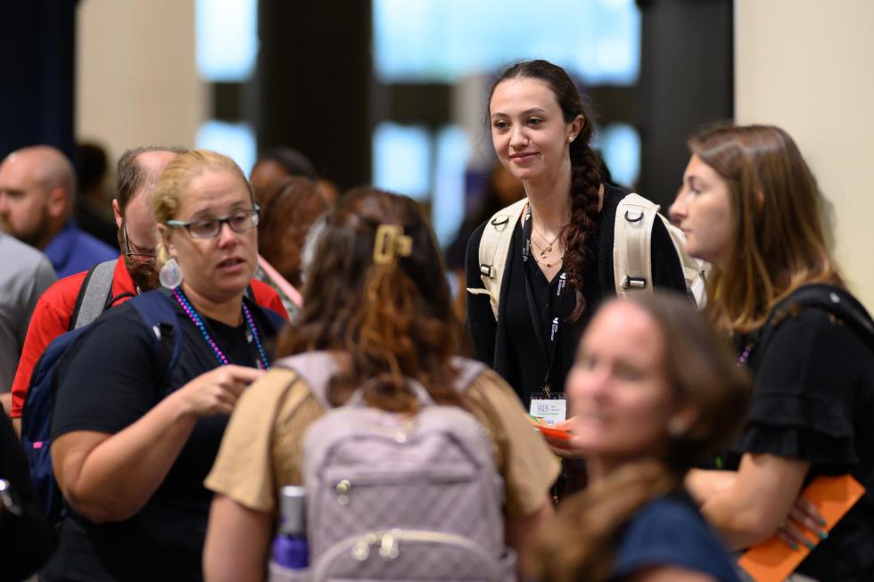 2025 attendees hang out in the lobby