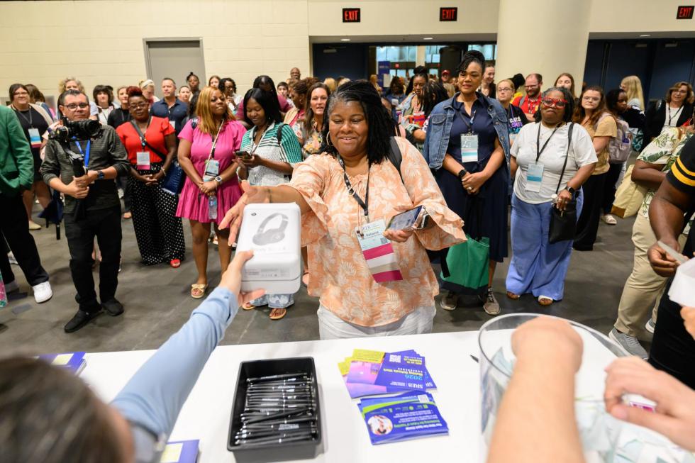 Attendees gather together to get prizes at the 2025 conference