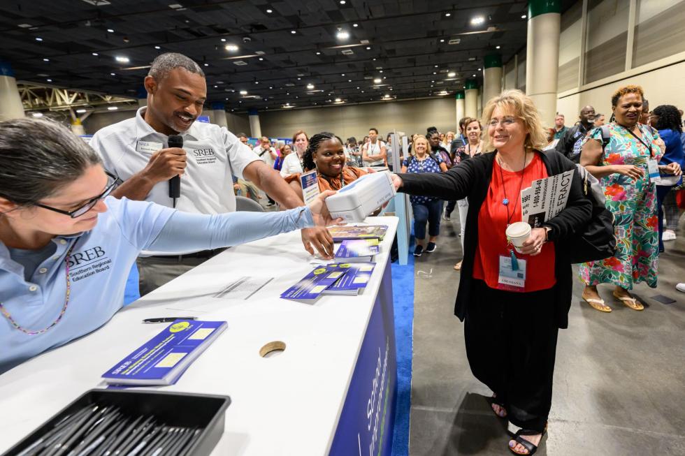 An attendee wins a prize at the 2025 conference