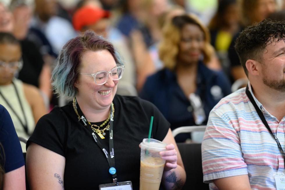 2025 attendees have fun in a session