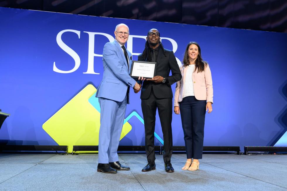 Pacesetter winners accept their award at the 2025 conference