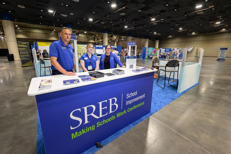 SREB team members get ready to work the 2025 SREB exhibit booth