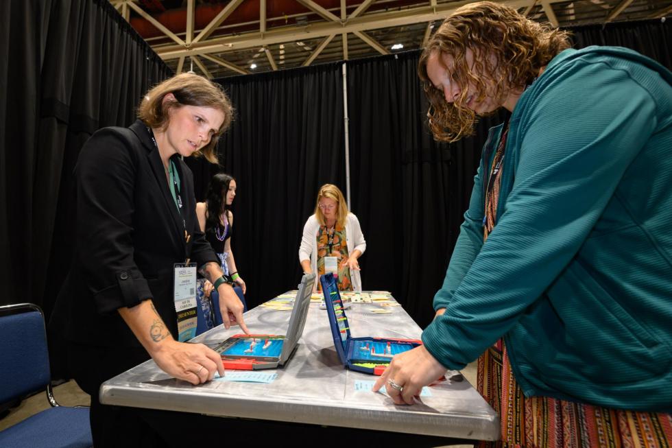 Attendees try to escape the room at the 2025 conference