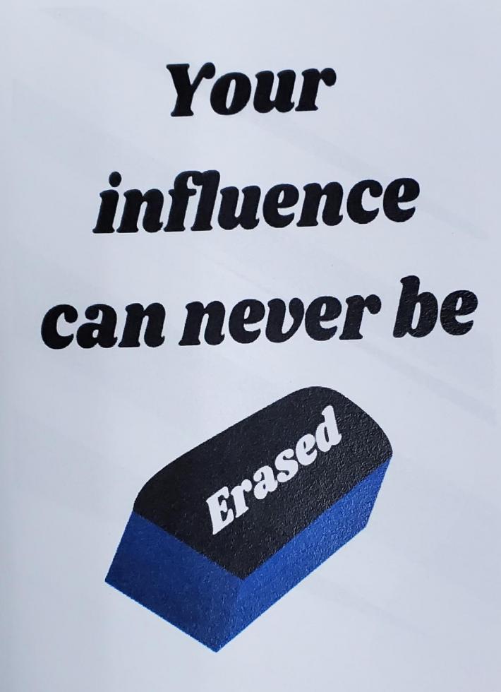An image of a sticker with an eraser on it that says "Your influence can never be erased."