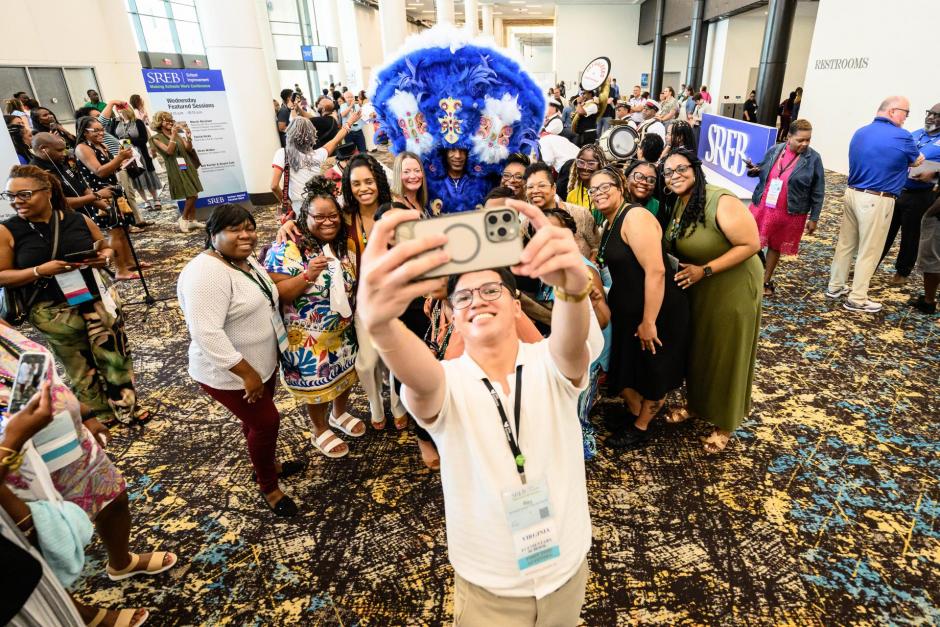 2025 attendees take a group selfie