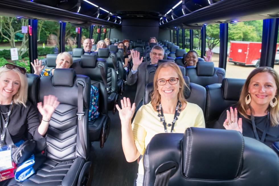 Attendees ride the bus at the 2024 conference in Nashville