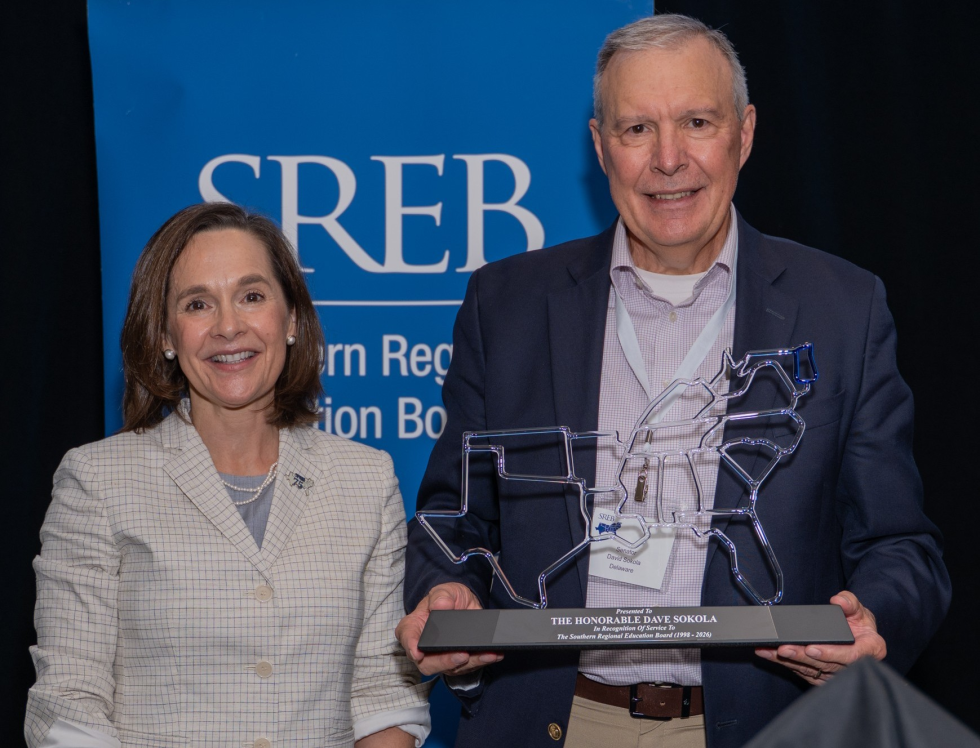 Valerie Greenhill and  Sen. Dave Sokola holding an SREB award for Distinguished Service