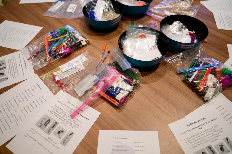 Bookmark kits at the 2026 Pay It Forward table.