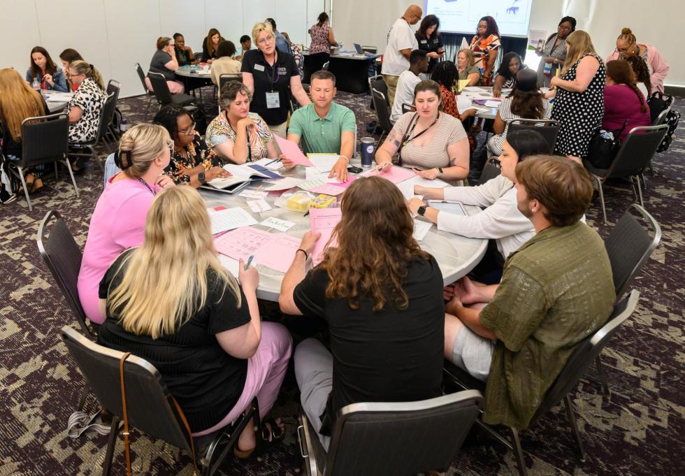 2025 attendees attend a preconference session