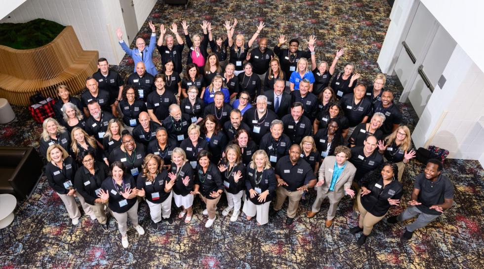 The School Improvement team gathers for a photo at the 2025 conference