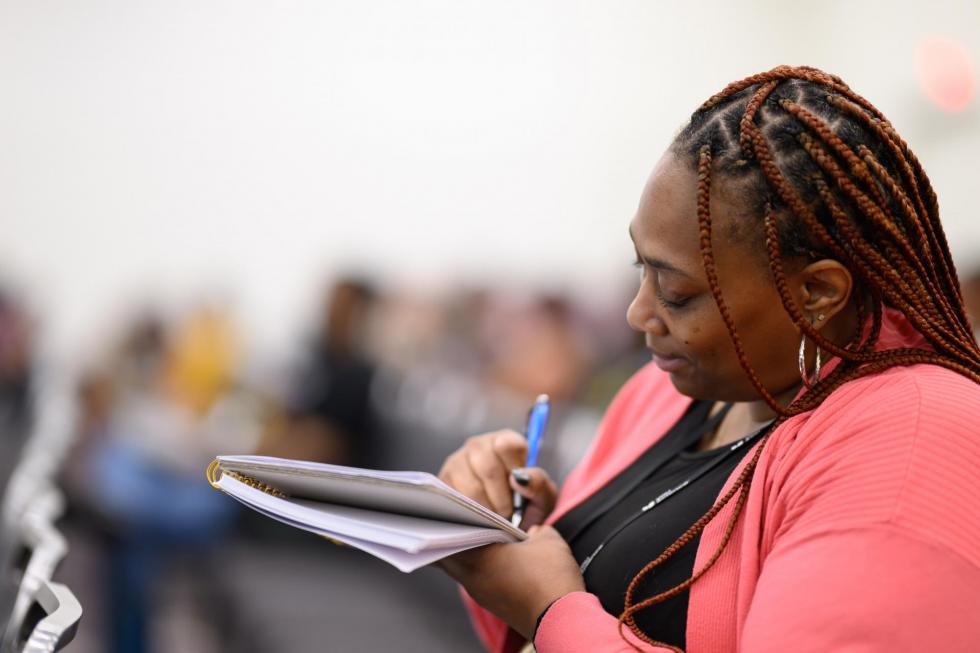 2025 Attendee takes notes