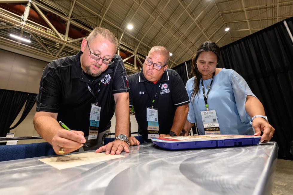 2025 attendees in the educational escape room