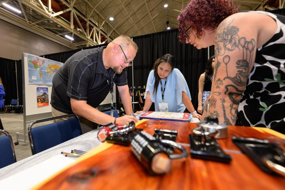 Attendees at the 2025 conference try to escape the room