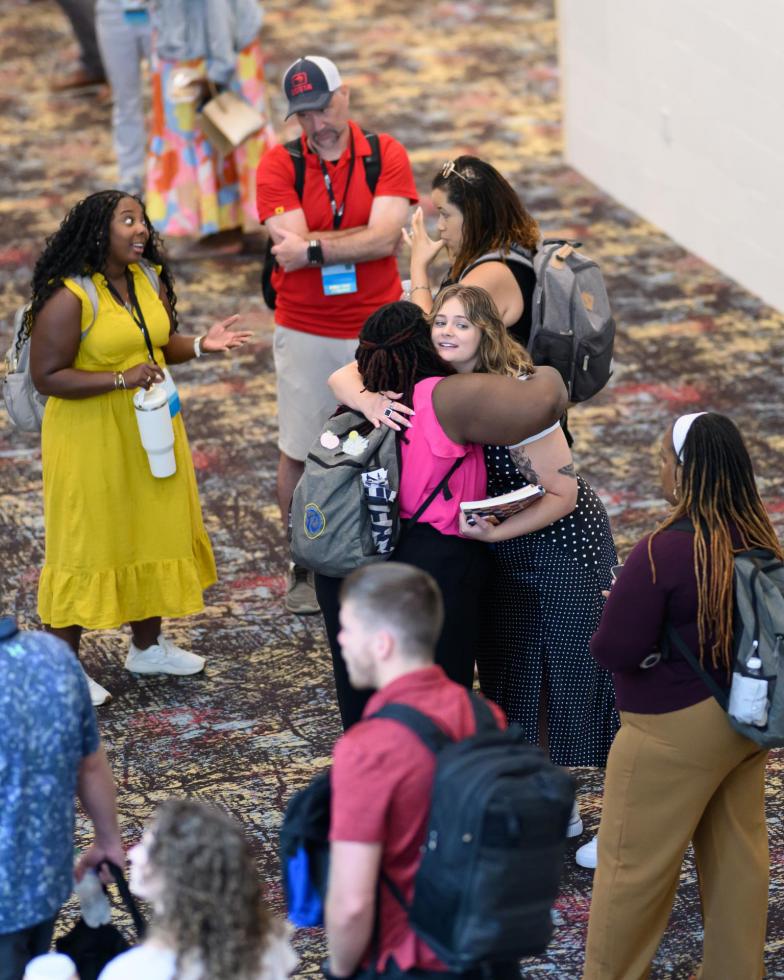 2025 conference attendees have fun in the lobby